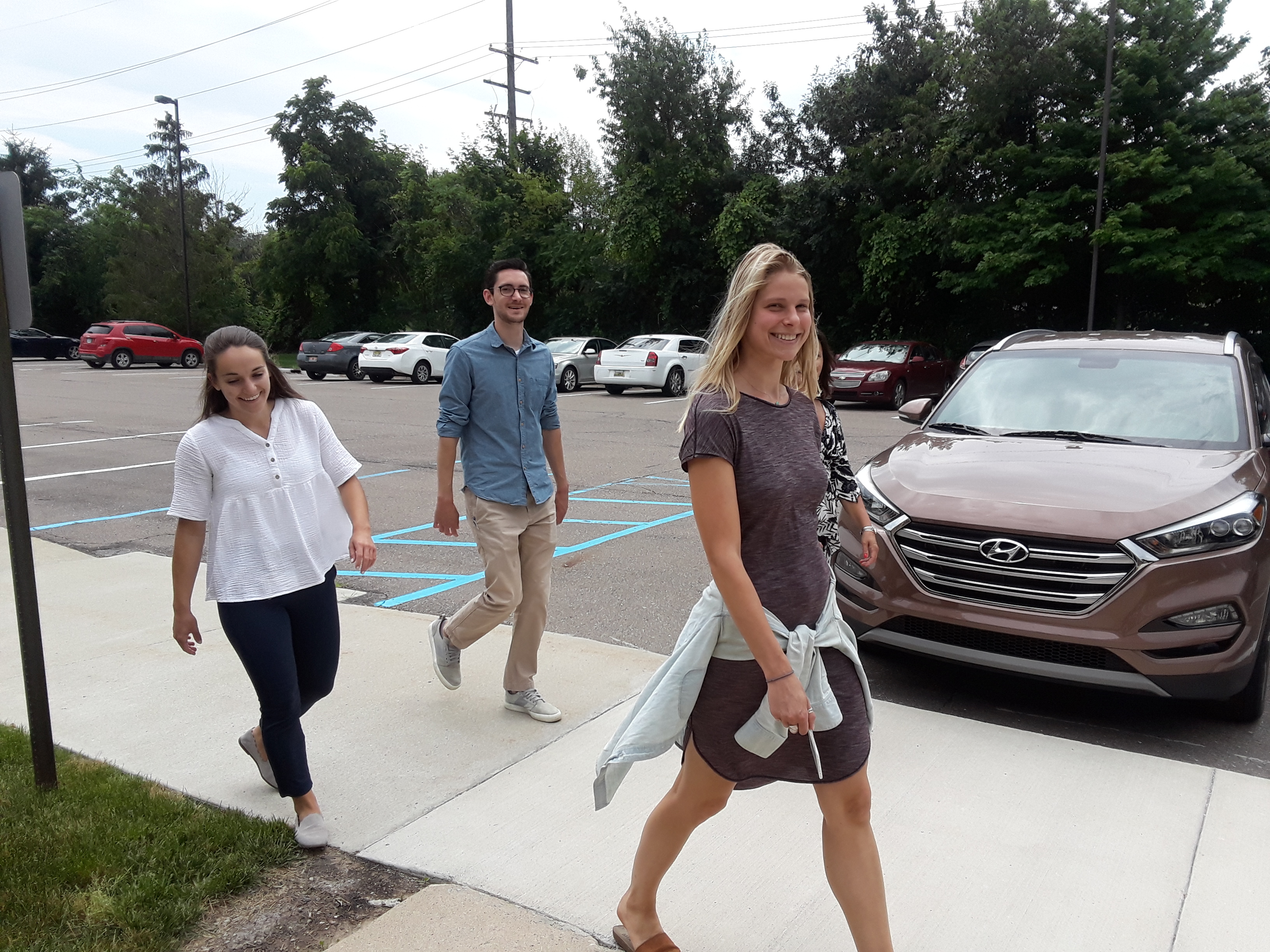 Employees at SEG Automotive walking outside during lunch. 