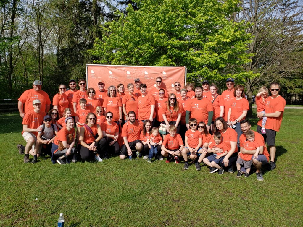 employees participating in a walk for the national kidney foundation. 