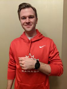 man showing off his new fitbit versa 2