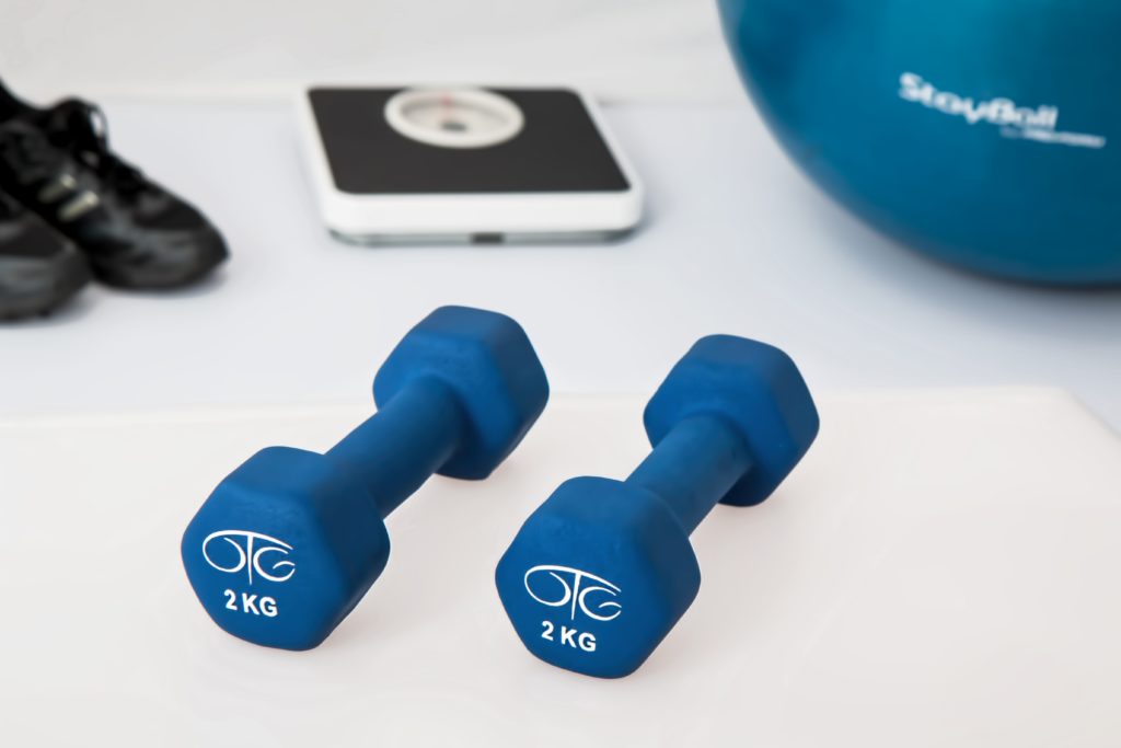 blue dumbell weights for an at-home workout