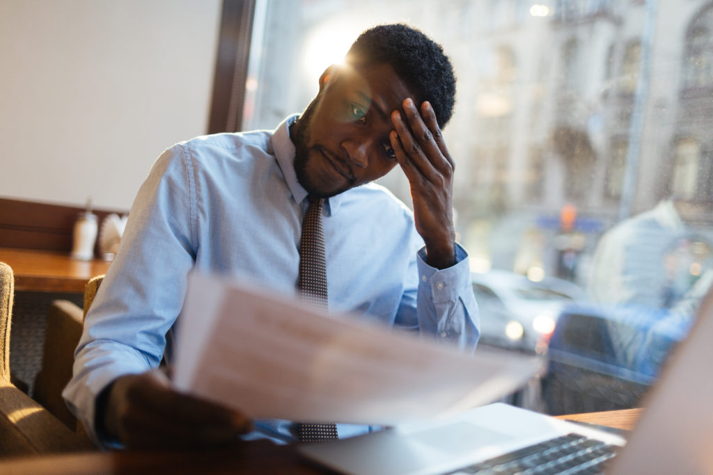 male employee experiencing seasonal depression at work 